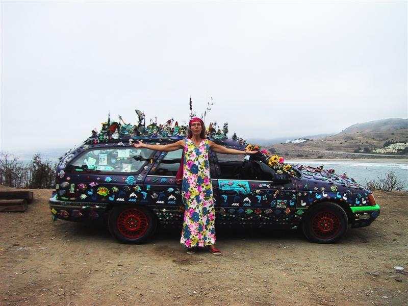 Illustration for article titled Groovalicious Purple Princess Of Peace Art Car Falls On Hard Times, Faces Crusher